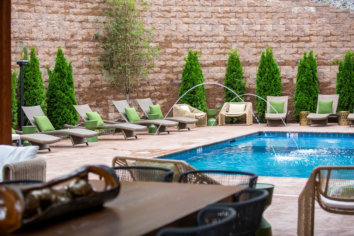 Lounge area of a luxury suite at The Swiftwater, contemporary décor and mountain views.