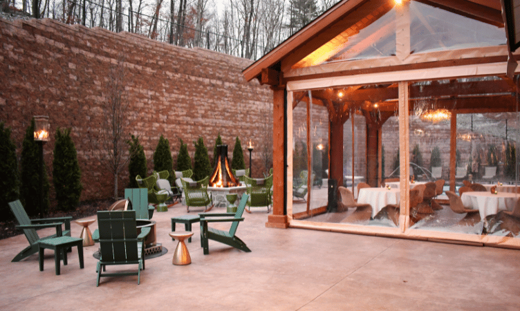 View of the indoor terrace at Swiftwater Hotel in the Poconos, featuring an elegant, light-filled space designed for relaxation and comfort.