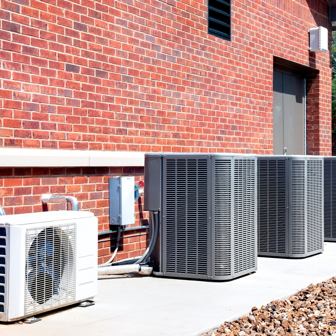 Commercial HVAC units receiving professional HVAC maintenance in Columbus OH.