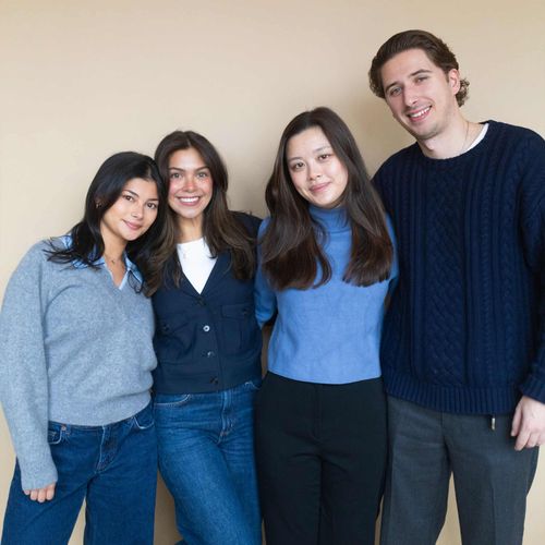 Four Dripos team members standing together