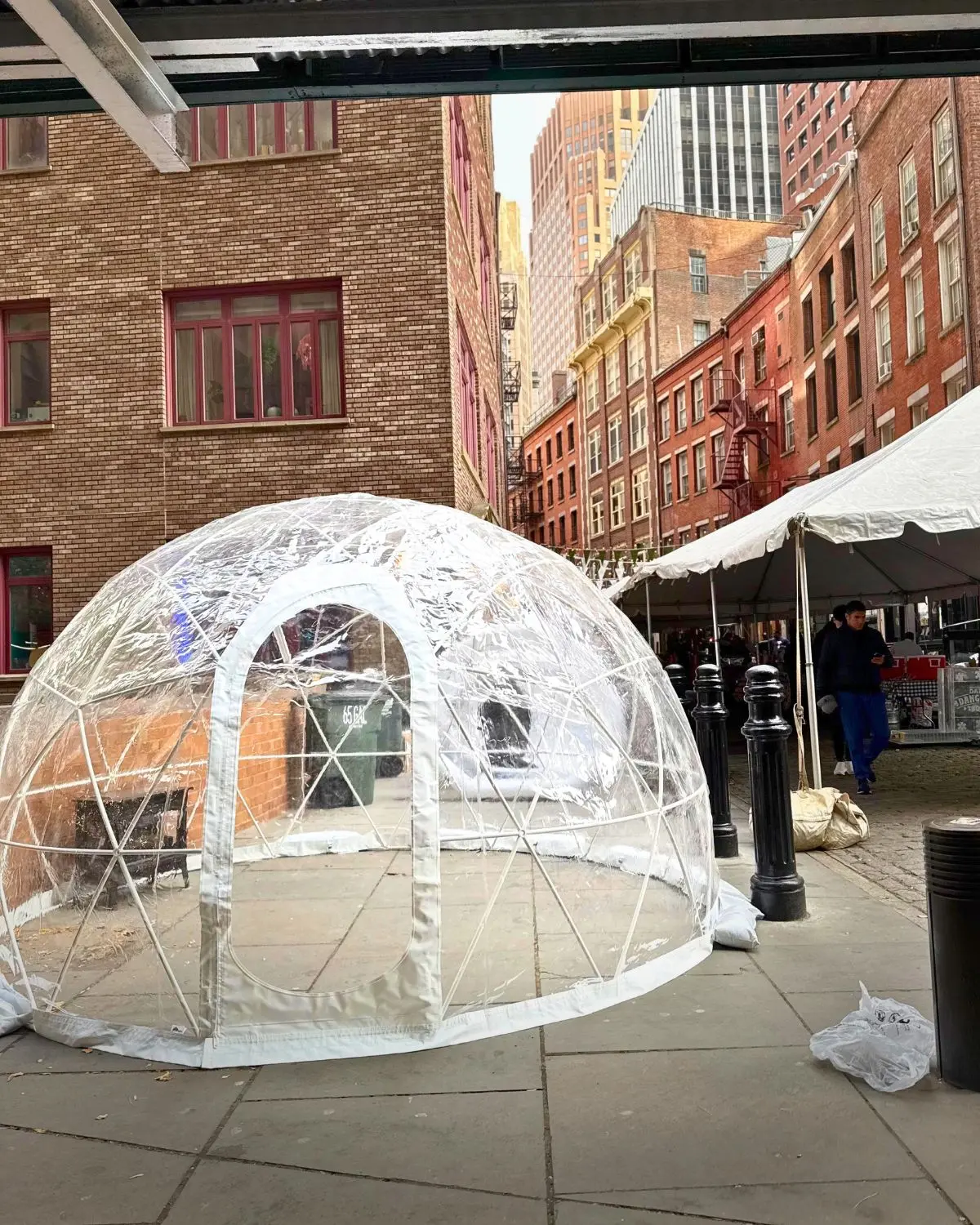 Heated igloo rental installed at a New York City street festival for outdoor event seating