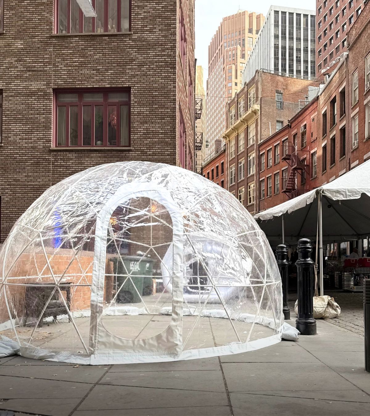 Furnished rooftop igloo rental with lounge seating in New York City