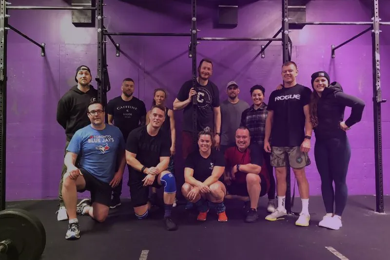 Purple branding on gym walls