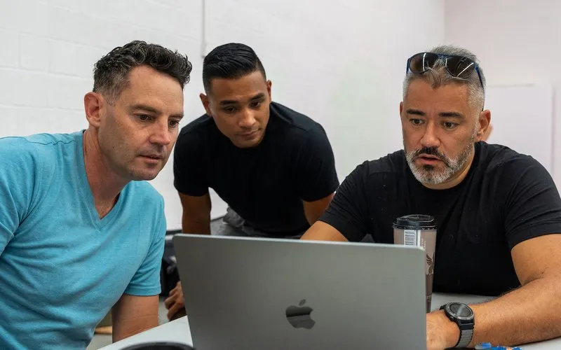 PushPress founders work on gym management software