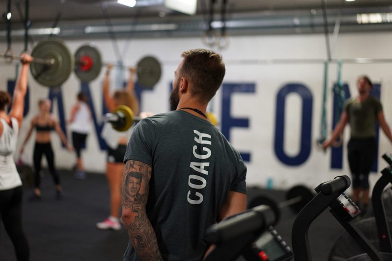 Paying gym coaches fair market value