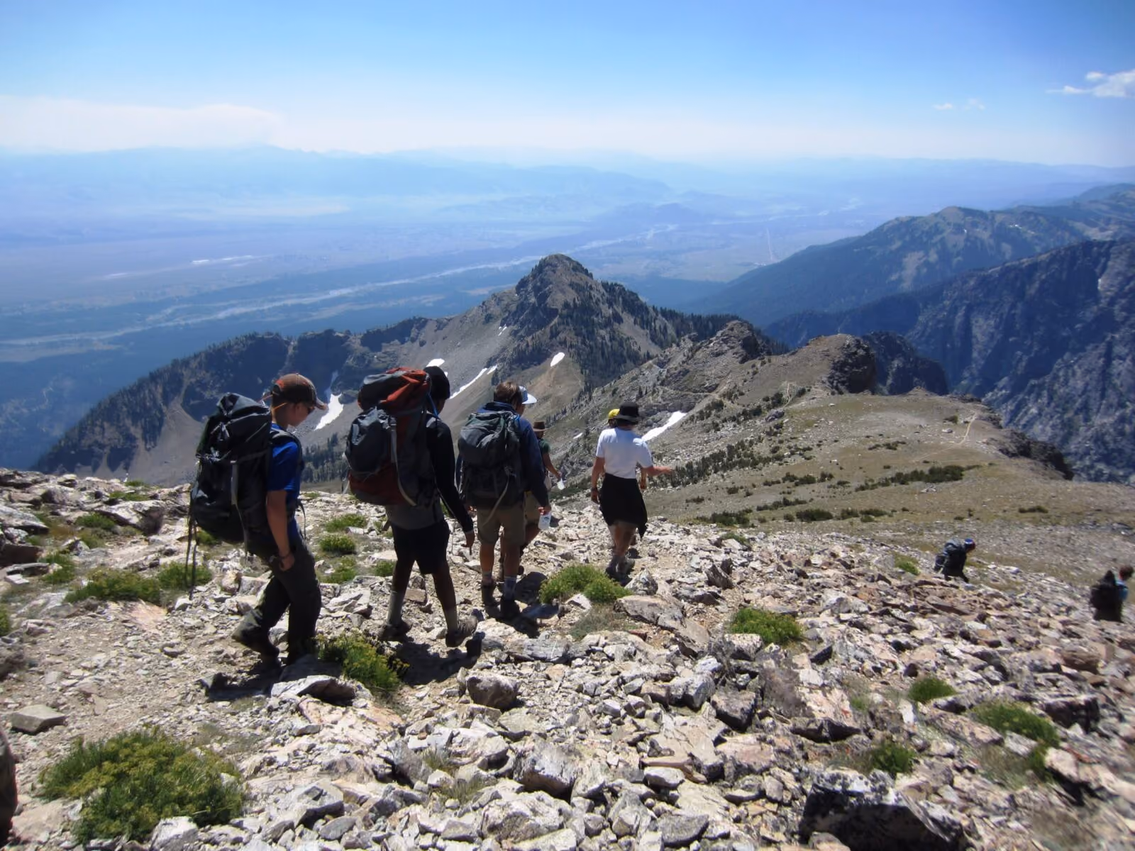 Hikers enjoy a clear day on the Static Peak Divide Trail.
