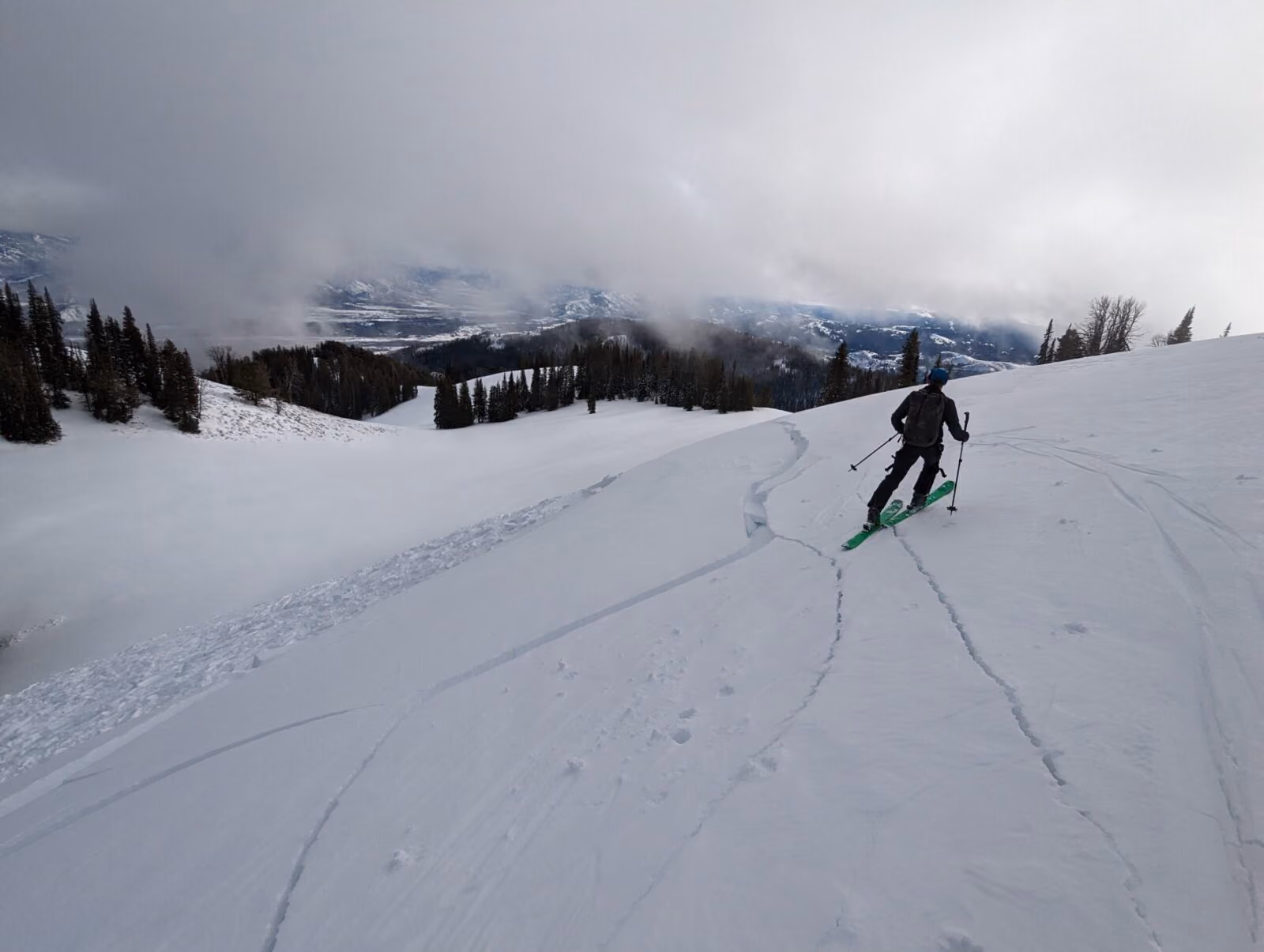 Spending time in the field to look at recent avalanche events and instabilities in the snowpack is an essential part of Travis' job.