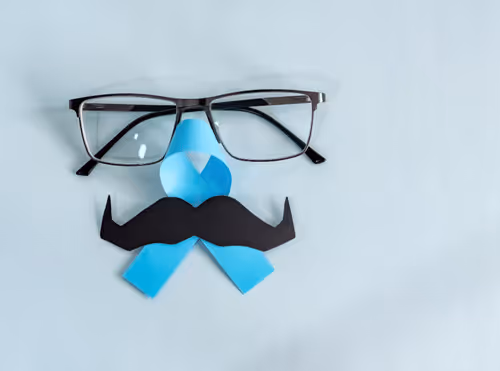 Man sitting calmly at home, reflecting on his general health and wellbeing