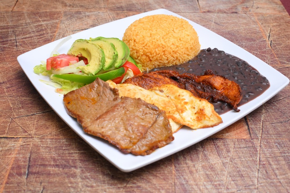 A plate of food with a variety of items on it.