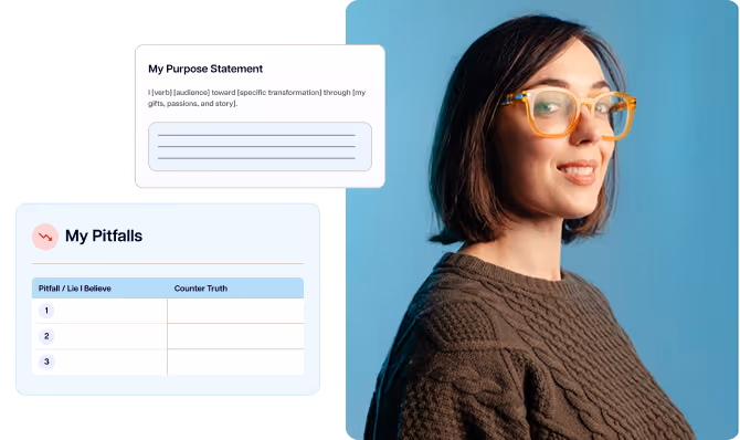 A woman wearing glasses and a brown sweater.