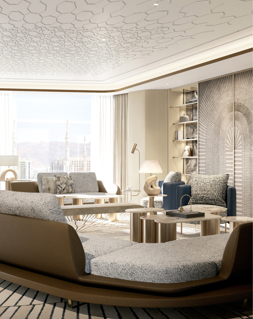 A stylish lounge space with low-profile curved sofas, metallic accents, and soft, warm ambient lighting.