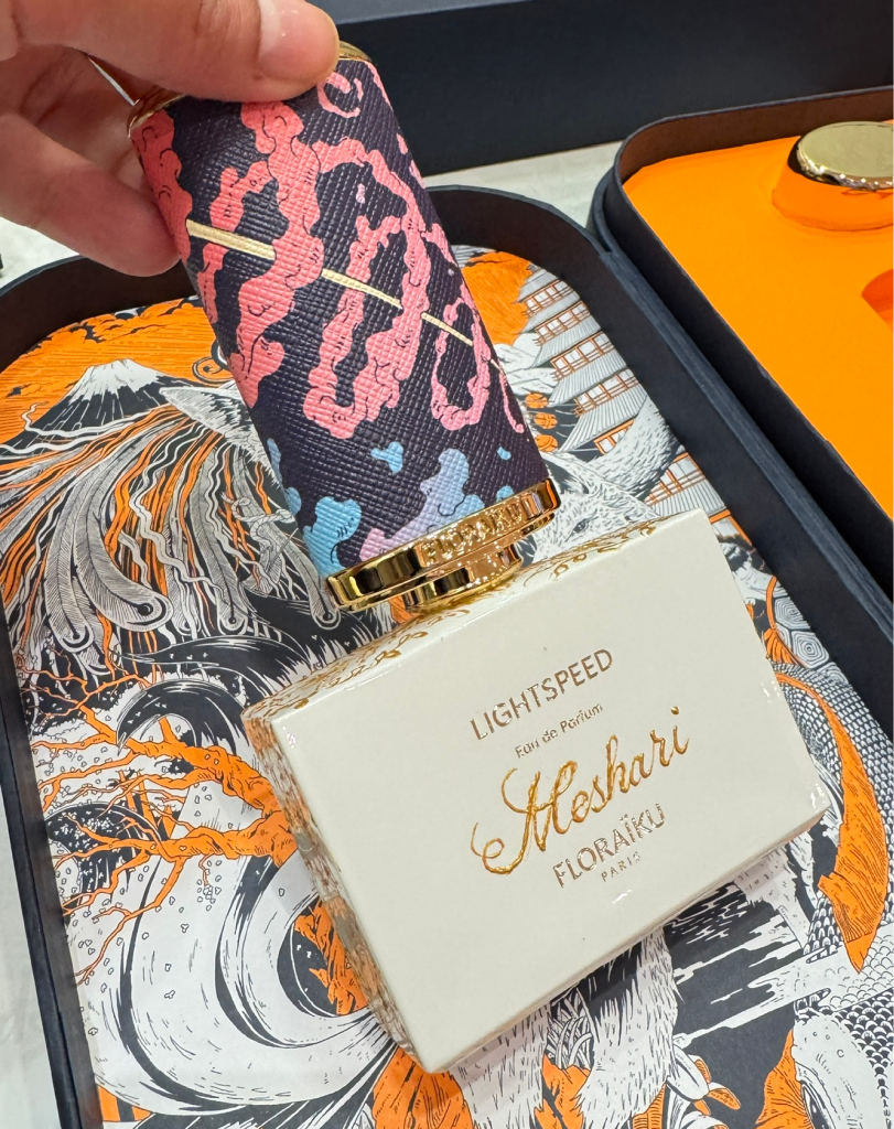 Floraïku Lightspeed perfume bottle featuring the name "Meshari" in custom gold script.