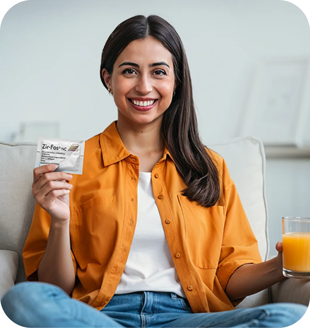 Mujer disfrutando del bienestar digestivo gracias a los beneficios de la bacteria en Zir-Fos NC