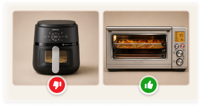 Side-by-side of a black air fryer with thumbs down and a silver countertop oven with thumbs up.