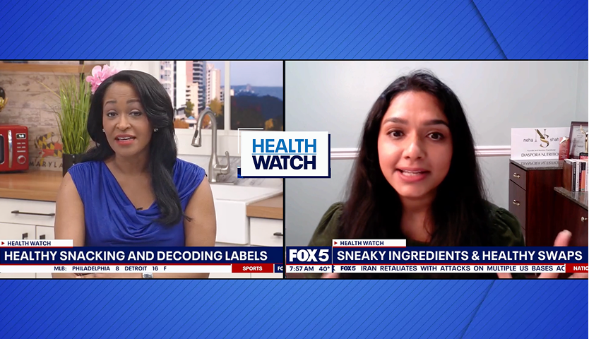 Two women discussing healthy snacking and decoding labels during a FOX 5 Health Watch segment.