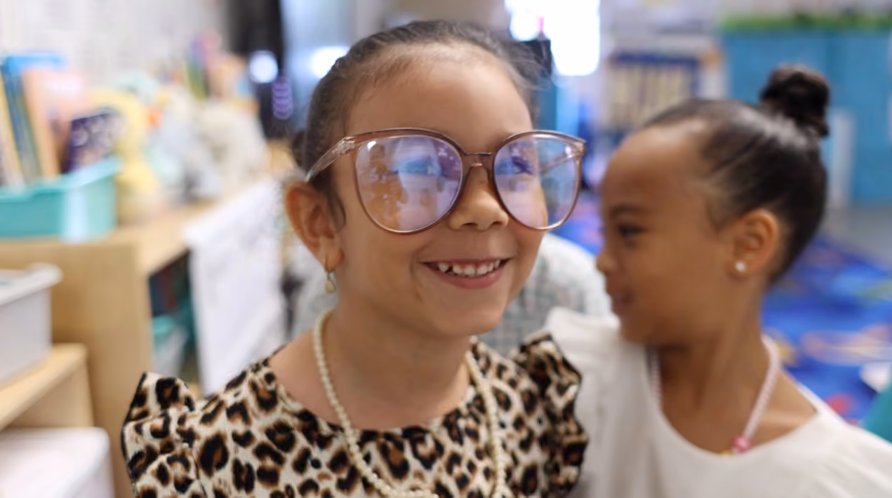 Two smiling Bronx Delta students