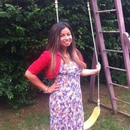 Sharda Singh standing outdoors near a garden swing