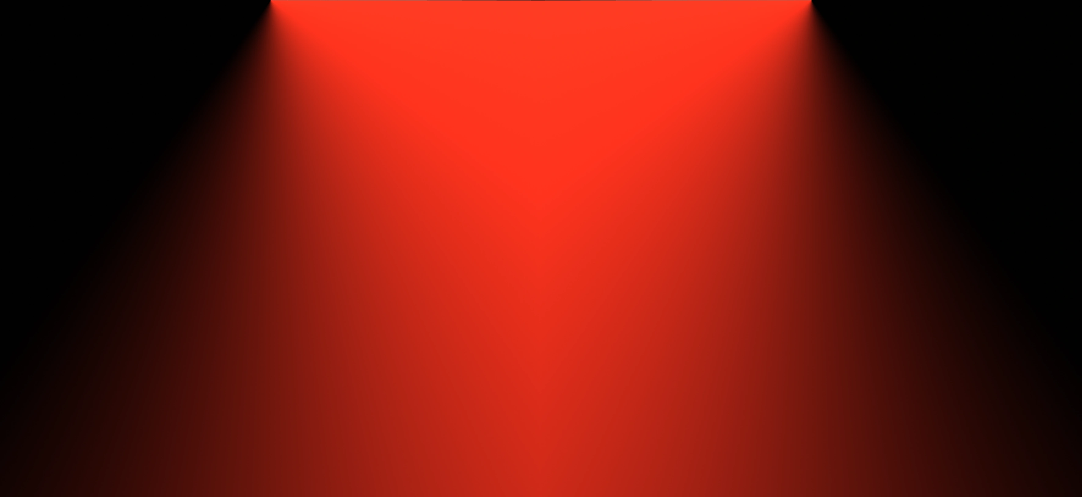 Red spotlight glow on dark abstract background.