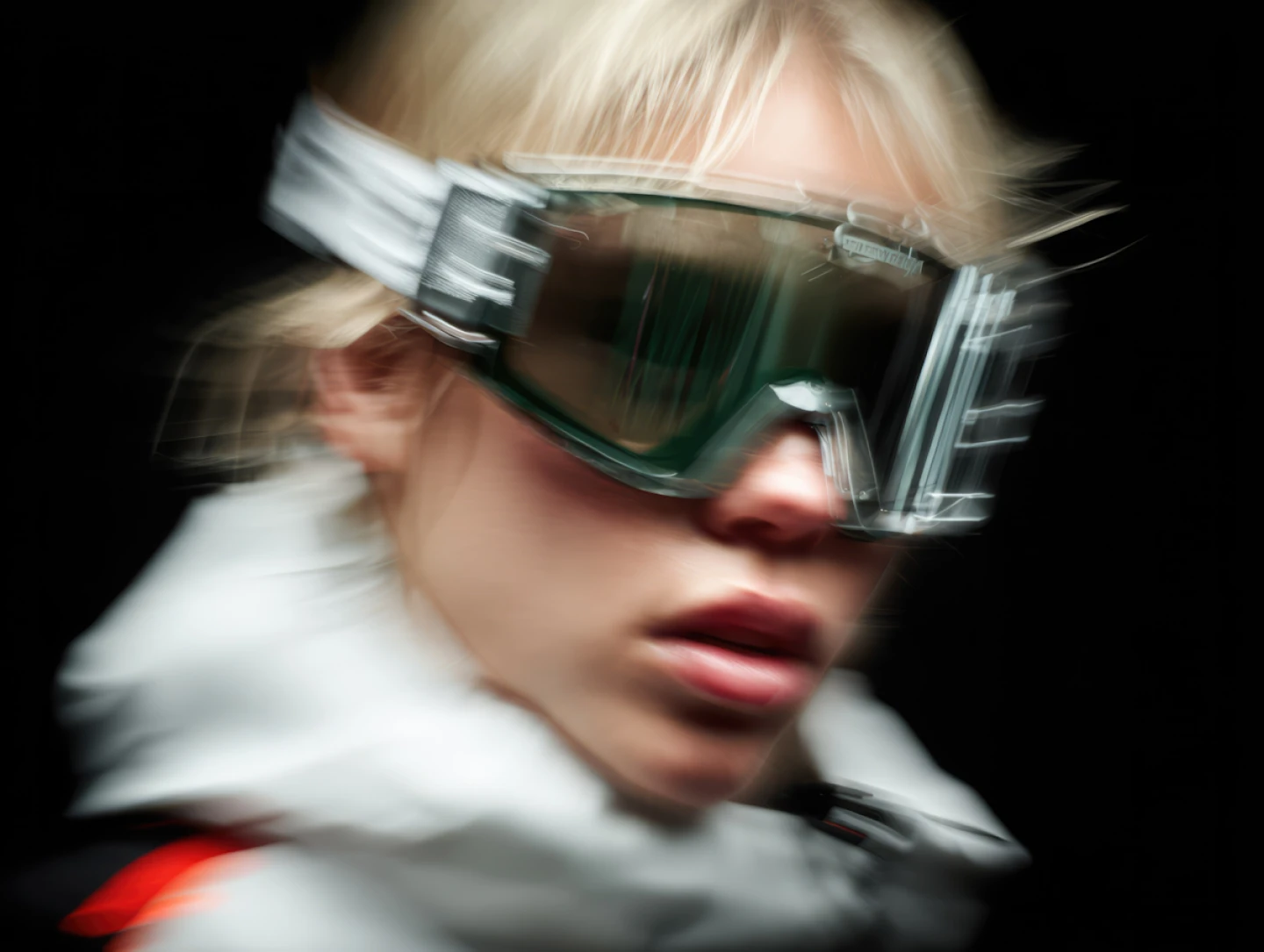 Close-up portrait wearing futuristic goggles.