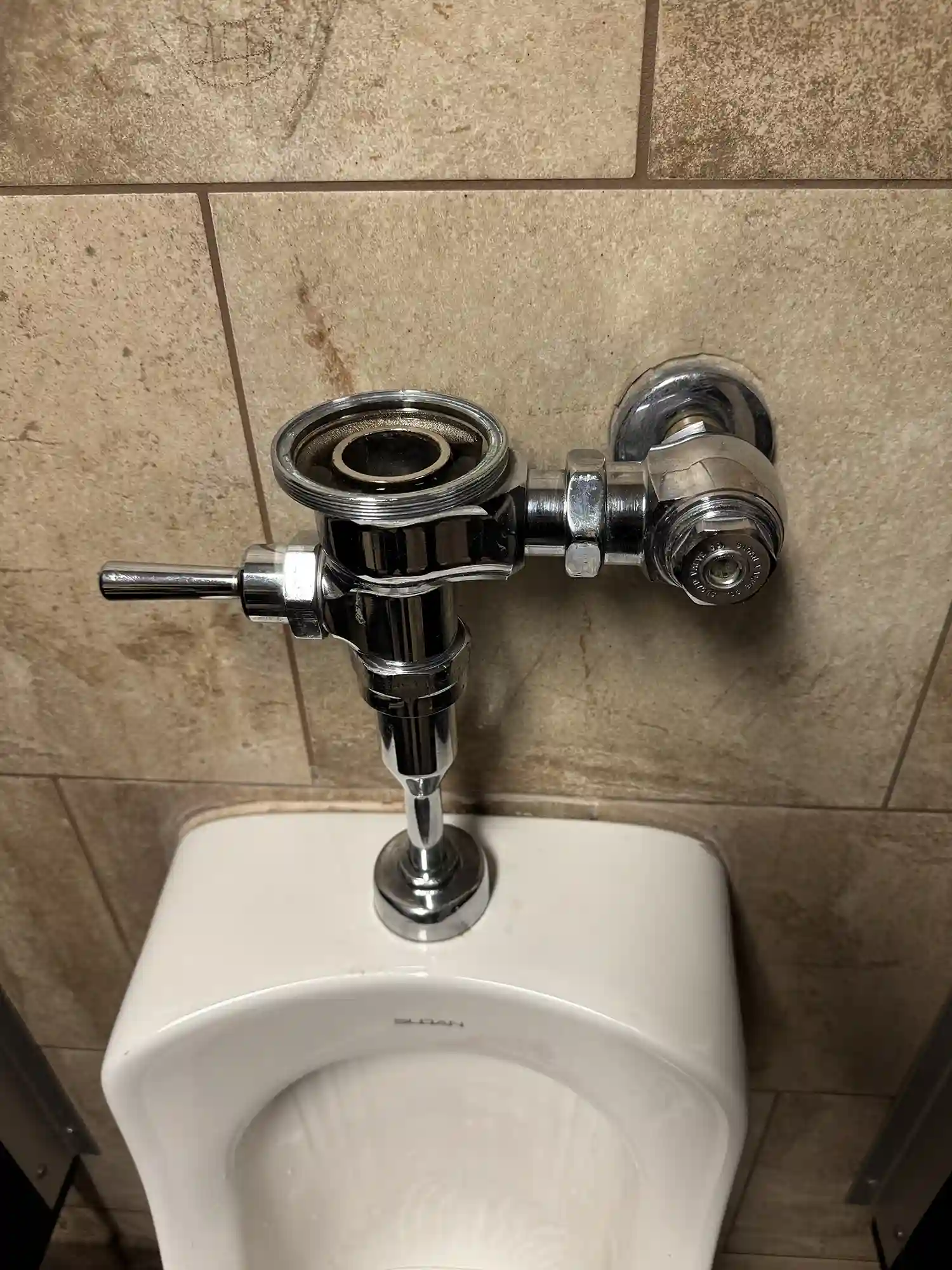 Urinal flush and piping repair by Prime Plumbing in Yucaipa.