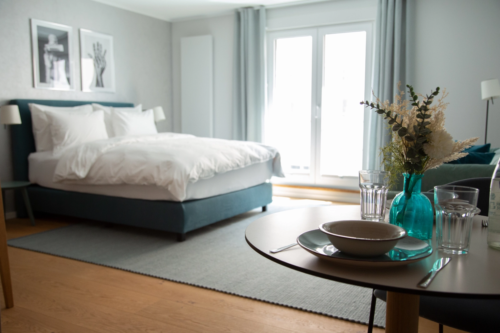 Schlafbereich mit Balkonzugang in der Executive Suite, 21rooms Ingolstadt