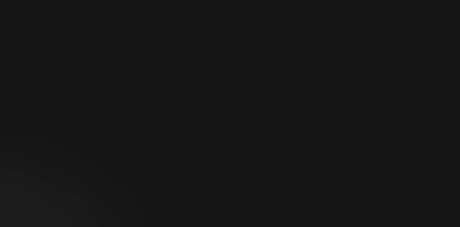 Dark abstract background with subtle gradient from black to dark gray.