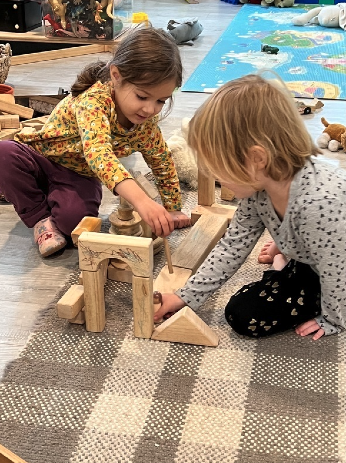 Children building and learning together through play-based education