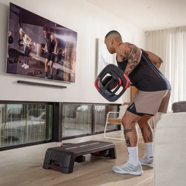 Person doing a guided workout at home