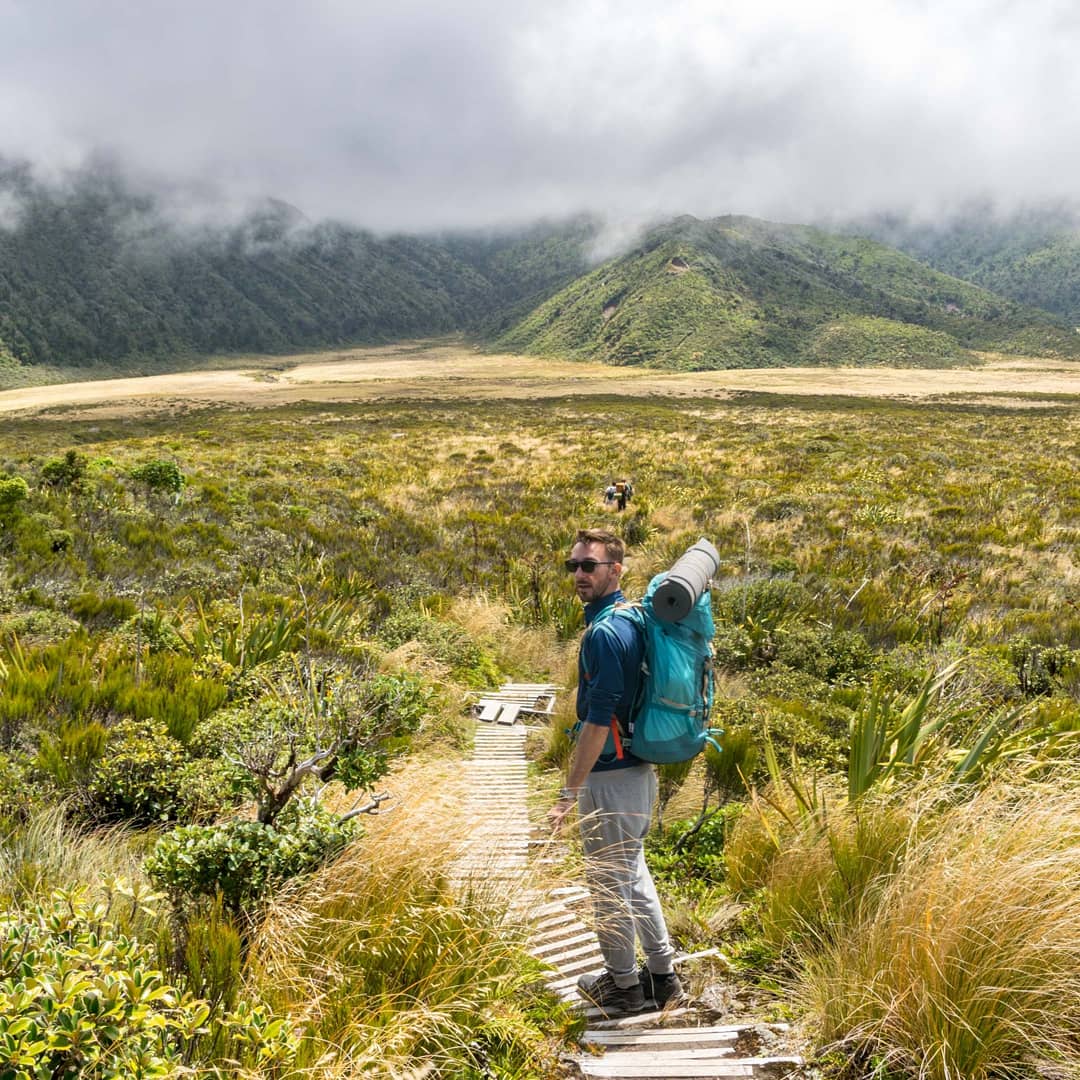 Hiker with a large blue backpack