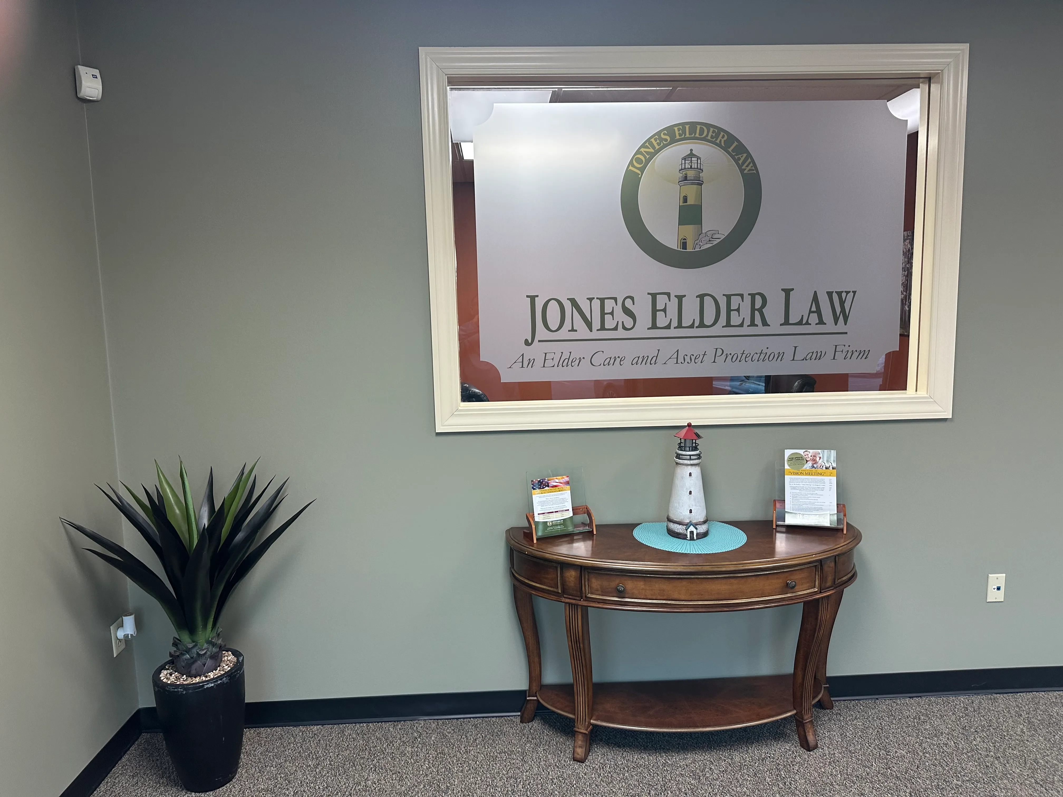 Reception area at Jones Elder Law with the firm's lighthouse sign
