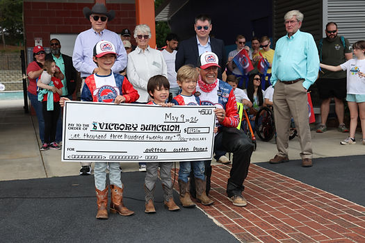 Overton, Cotten, and Davant Petty donated $1,321 to Victory Junction after selling art work they made during the KPCRAA.