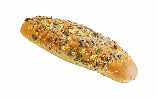 Loaf of bread topped with mixed seeds and oats on a white background.