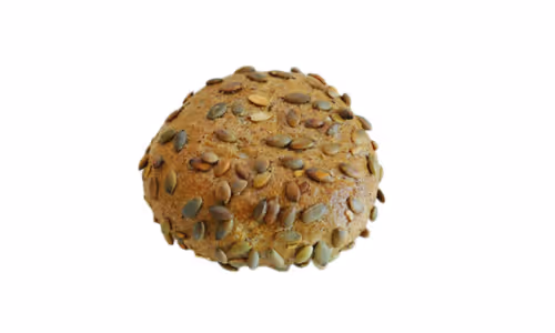Round bread roll topped with scattered pumpkin seeds on a white background.
