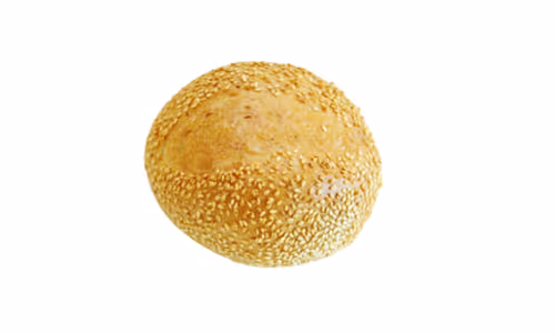 Golden sesame seed bun isolated on white background.