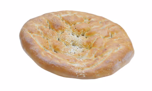 Round flatbread with a golden crust sprinkled with sesame seeds on a white background.