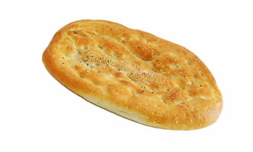 Oval flatbread with a golden crust topped with sesame and black seeds on white background.