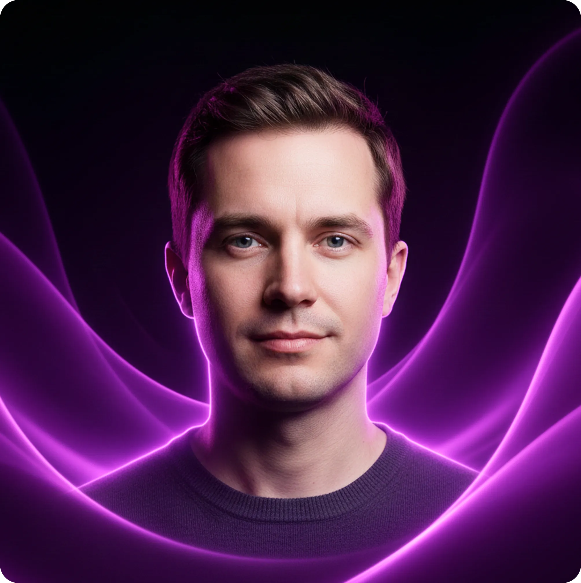 Portrait of a man with short brown hair and blue eyes, illuminated by glowing purple wave-like light patterns.