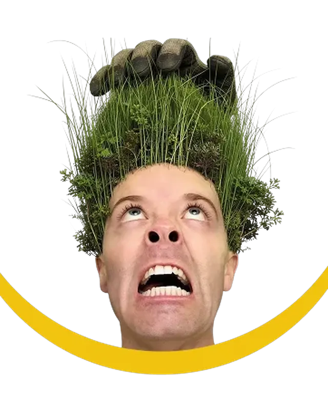 Man with overgrown grass on his head representing lawn maintenance needs in Tampa