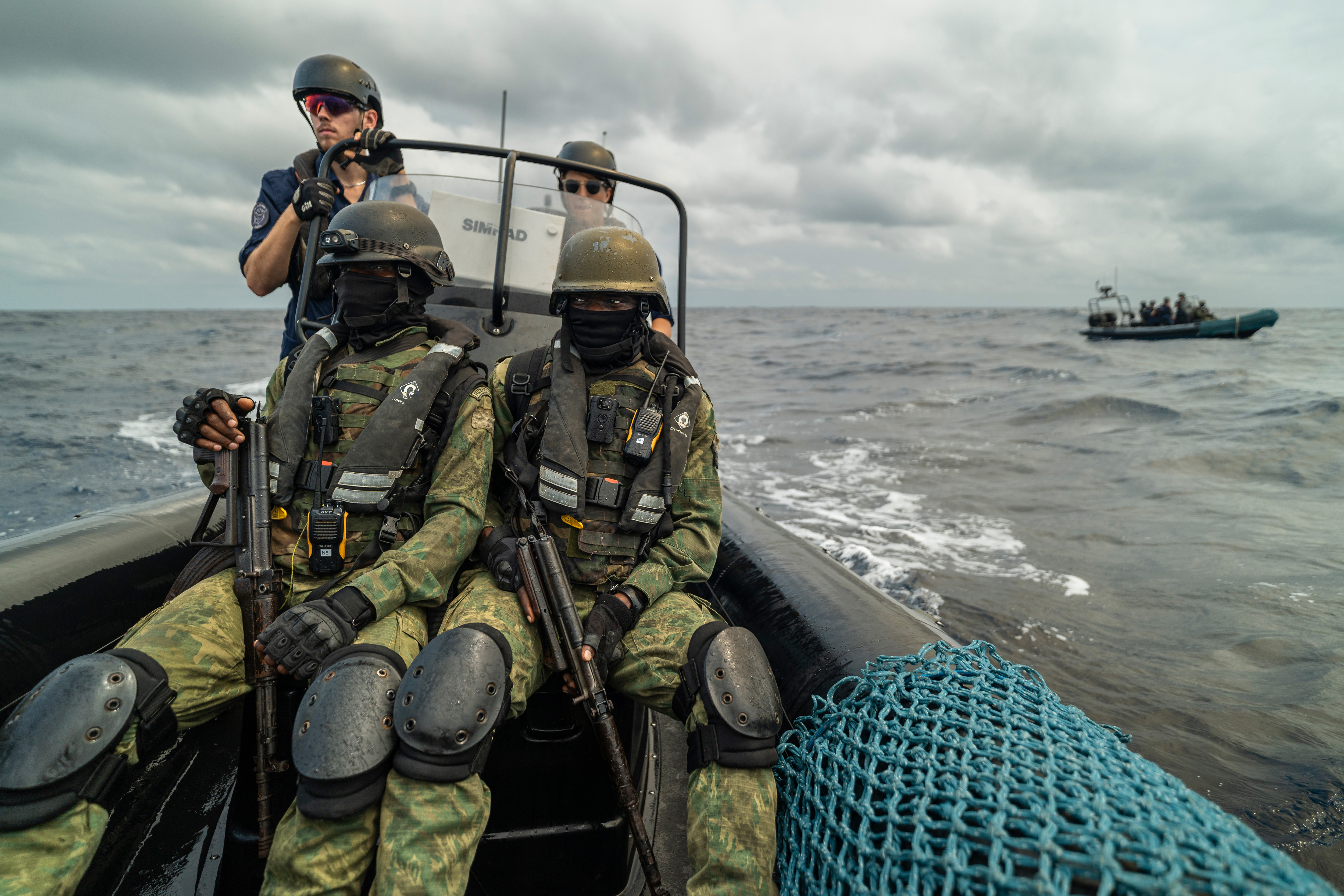 Image of two soldiers from Sao tome e Principe embedded on patrol with Sea Shepherd global crewmembers