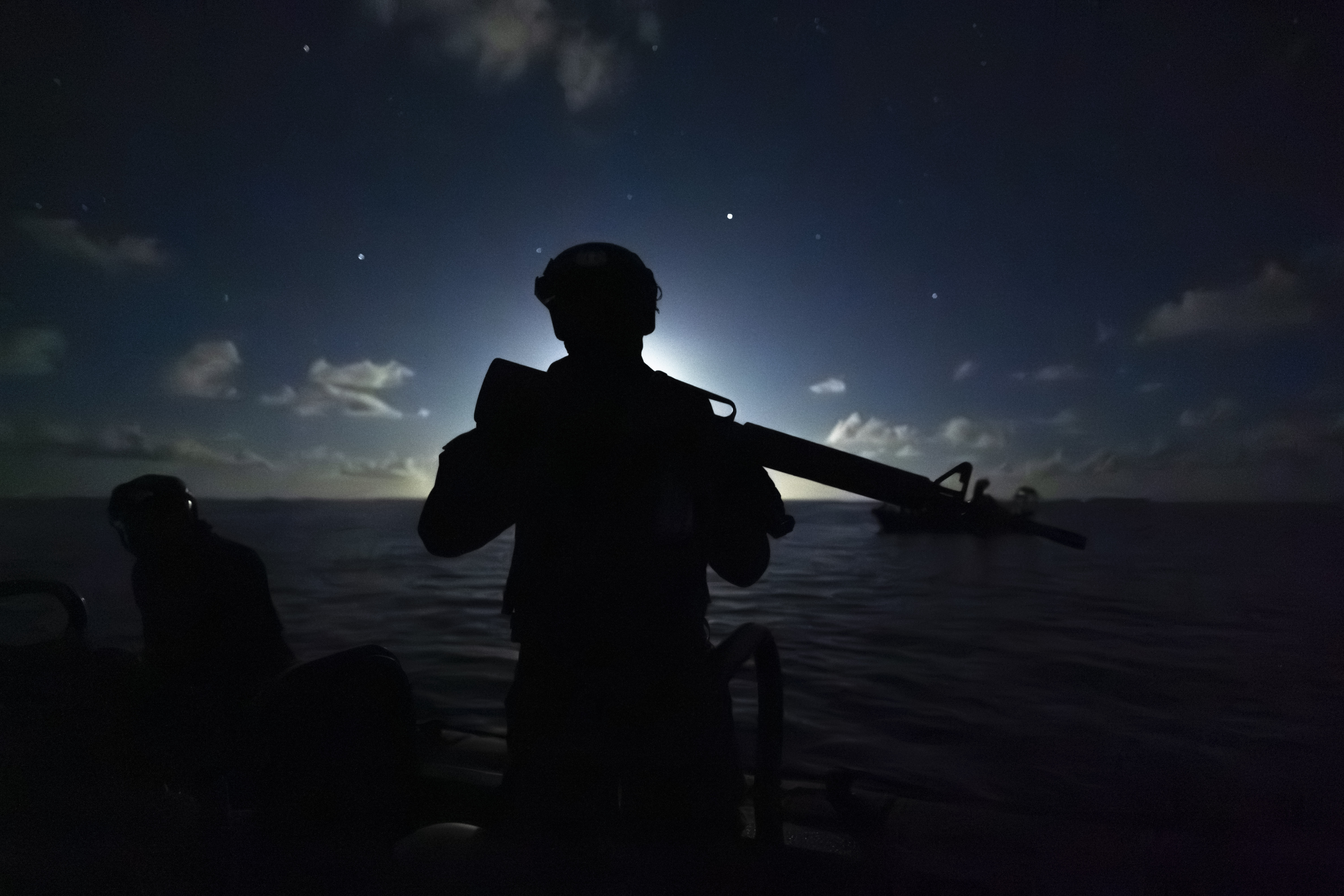 image of volunteers cleaning a beach