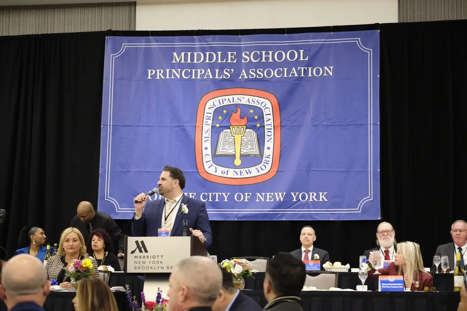 Speaker addressing Middle School Principals' Association of New York City event