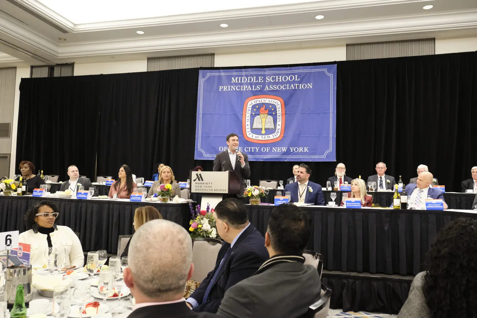 Speaker addressing Middle School Principals Association meeting attendees