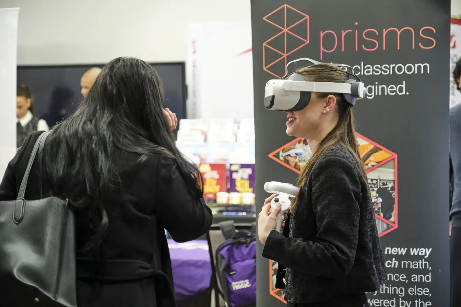 Student demonstrates virtual reality classroom technology at education expo