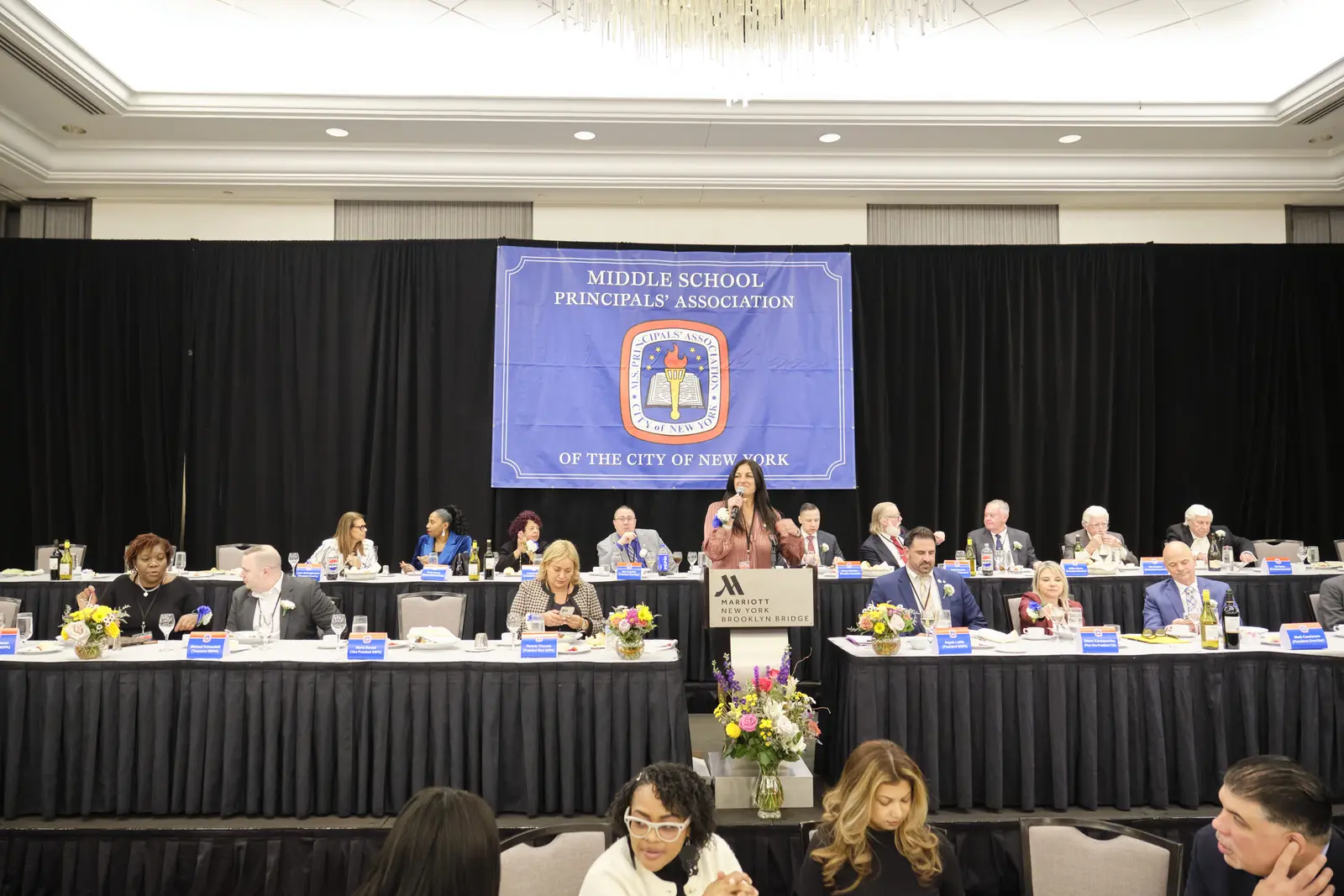 Middle School Principals' Association meeting with speaker at podium