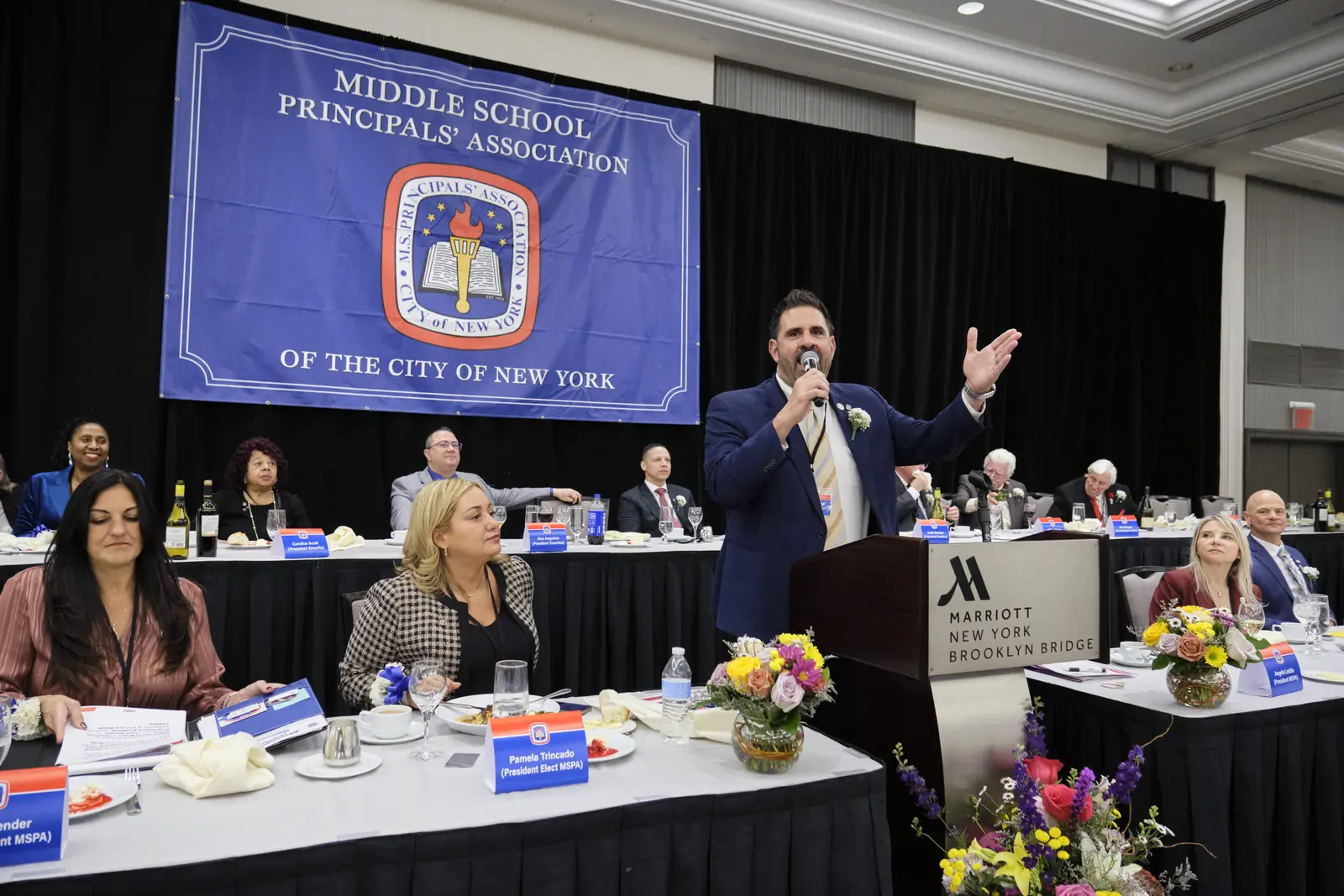Principal speaking at Middle School Principals' Association event
