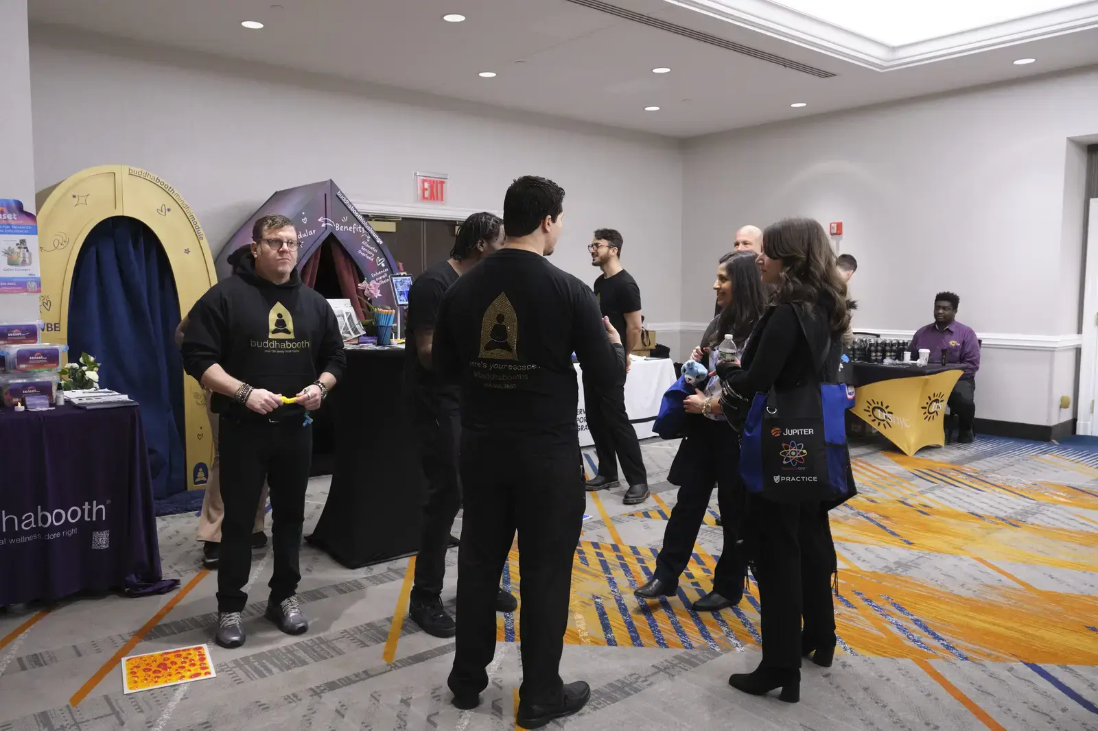 Students networking at exhibition booths during school event
