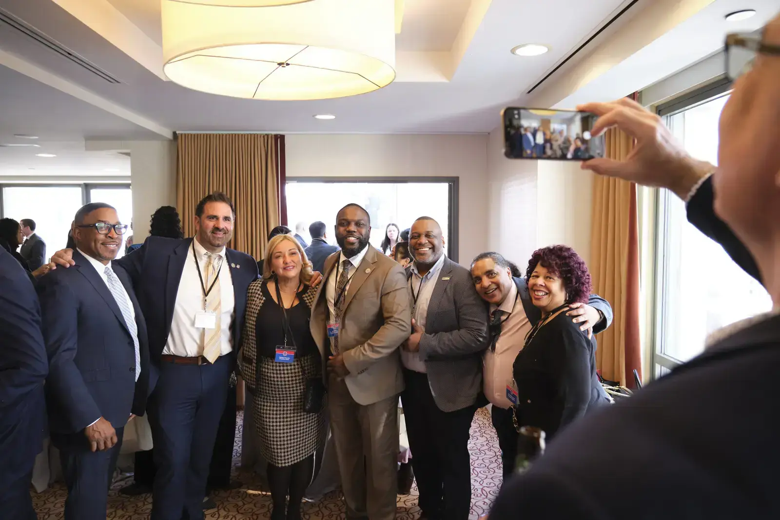 Group of educators posing for photo at school event