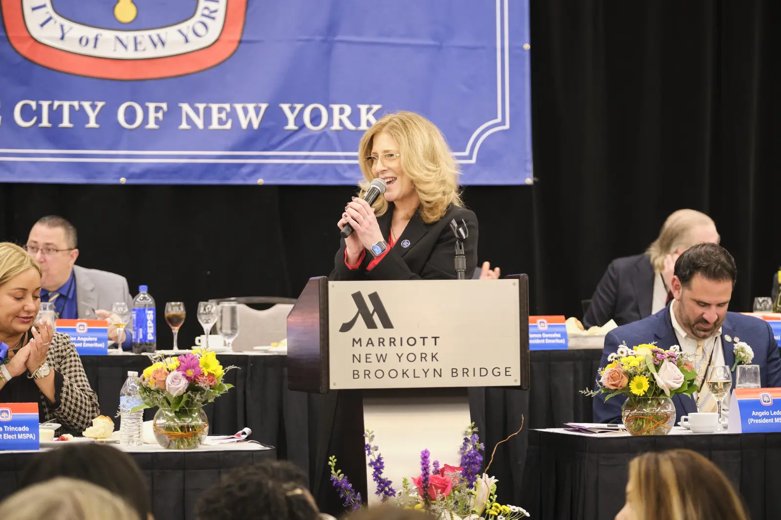 Speaker addressing audience at City of New York event