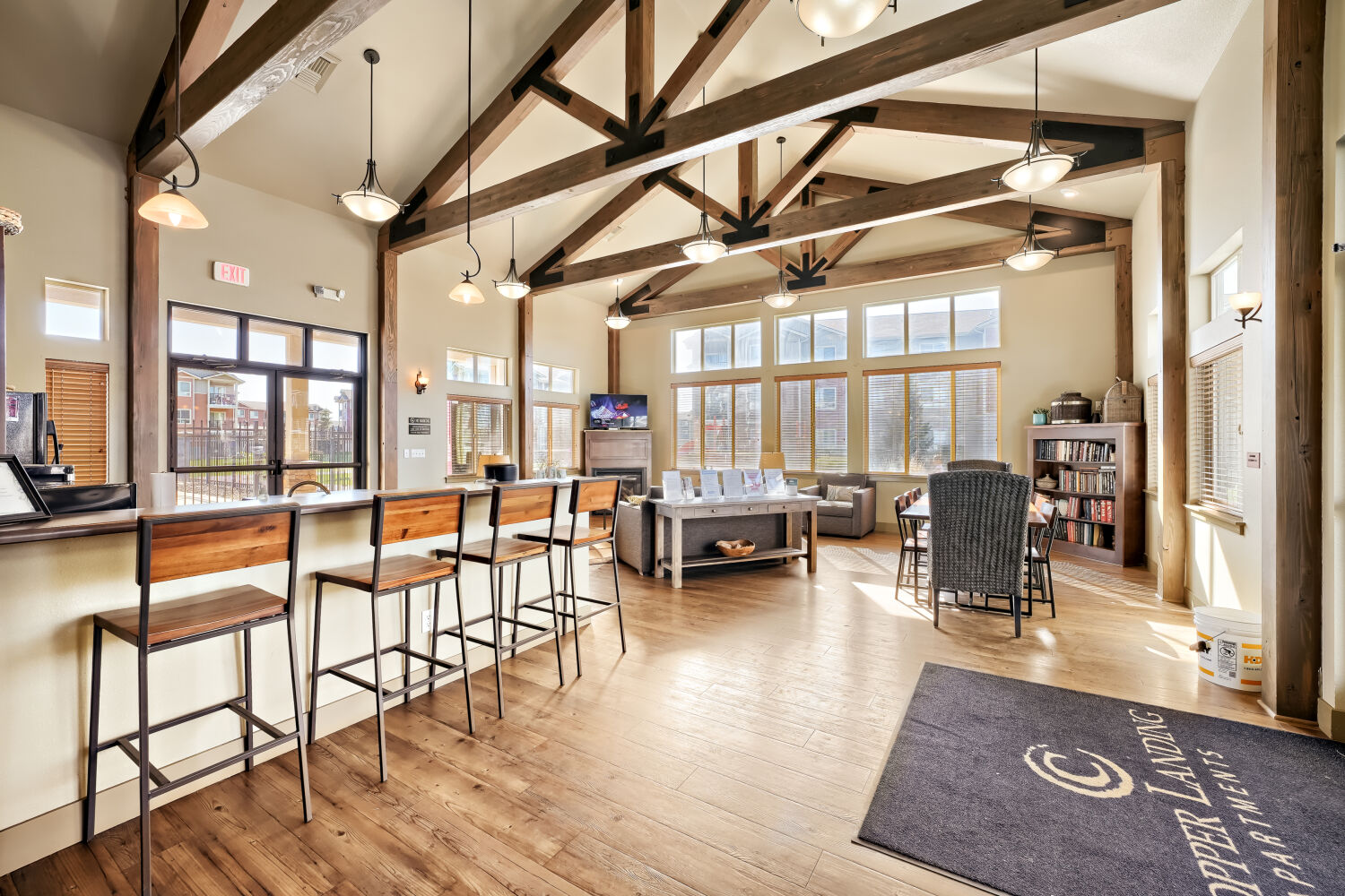 Resident clubhouse at Copper Hill Apartments with comfortable seating, fireplace, and gathering spaces in Spokane, Washington
