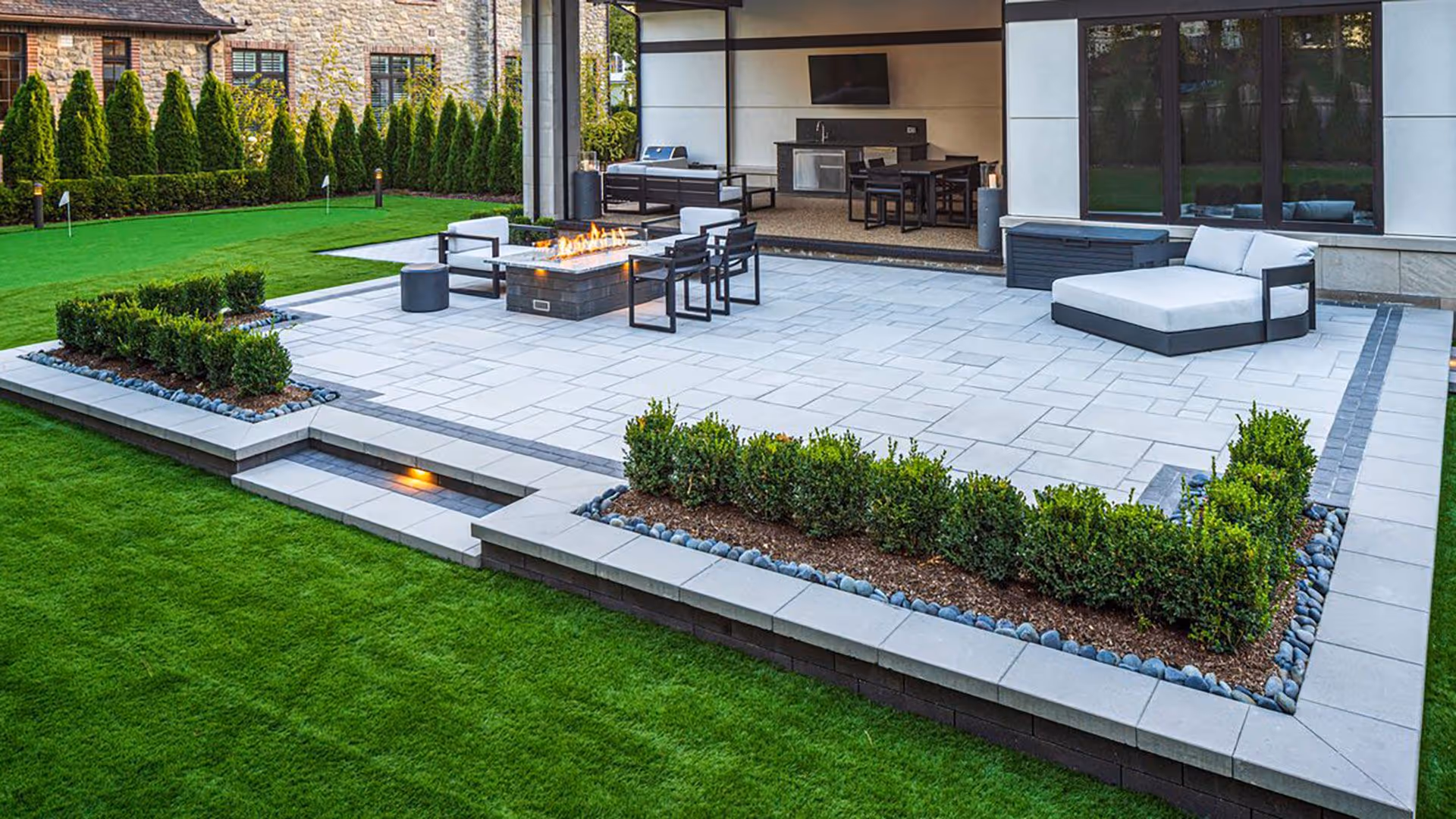 Landscaping and hardscaping installation by Roi Property Services delivering durable outdoor solutions in Metro Detroit